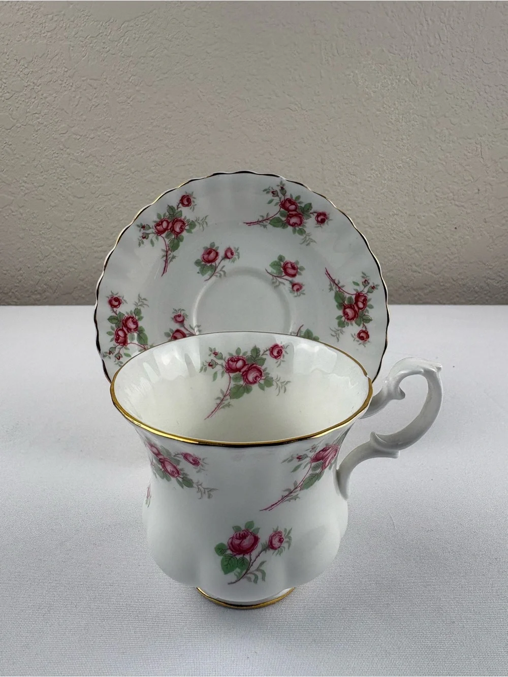 Royal Albert Bone China Teacup and Saucer Featuring the Rose Time Pattern